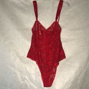 Red lace teddy, high leg, satin details and straps, zip closure size M
